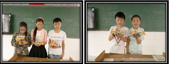 学生们展示自己制作的手工机械作品